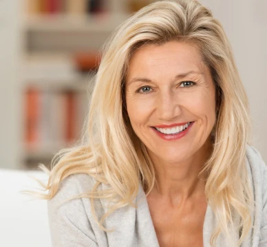 Woman facing forward smiling